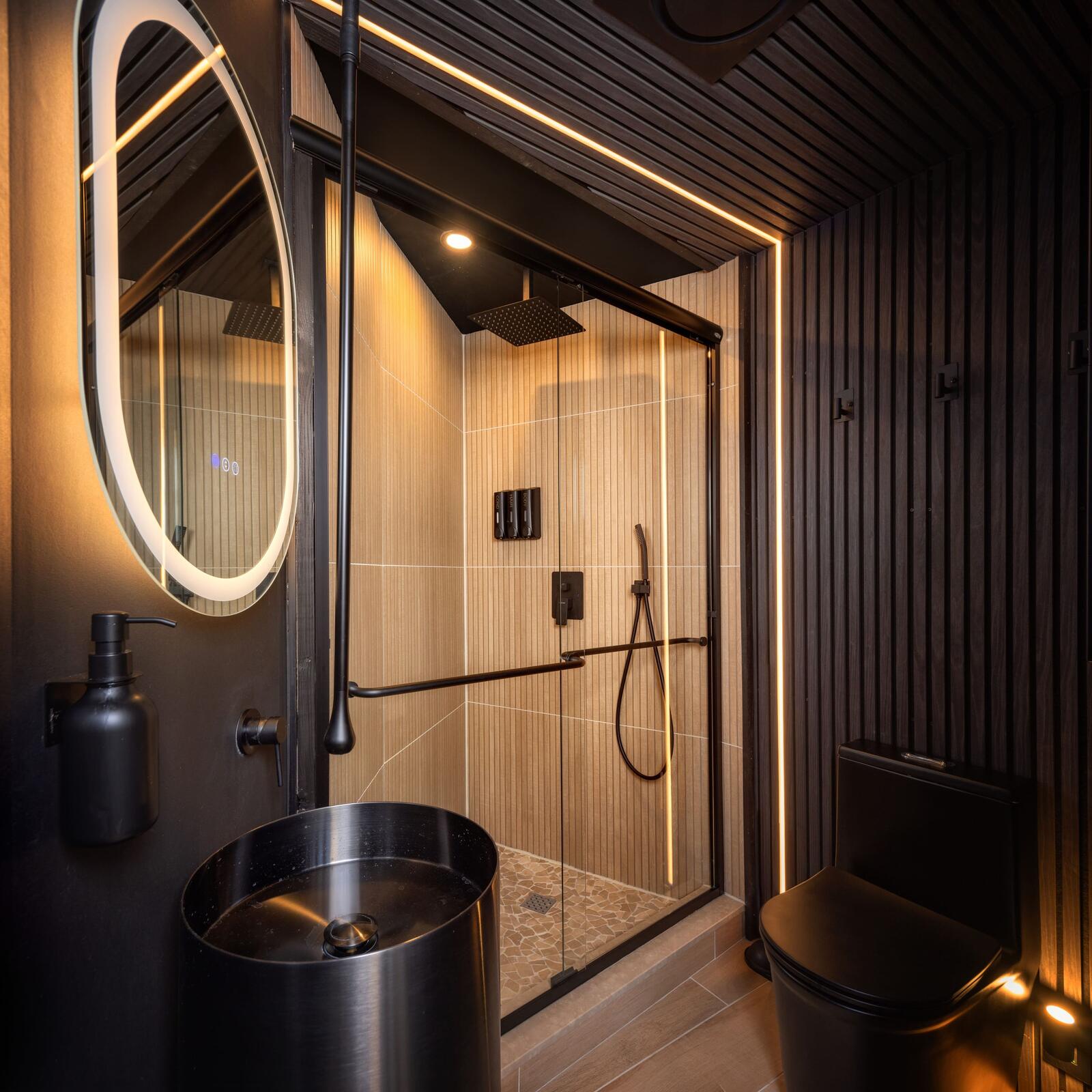 A bathroom with a rainfall shower